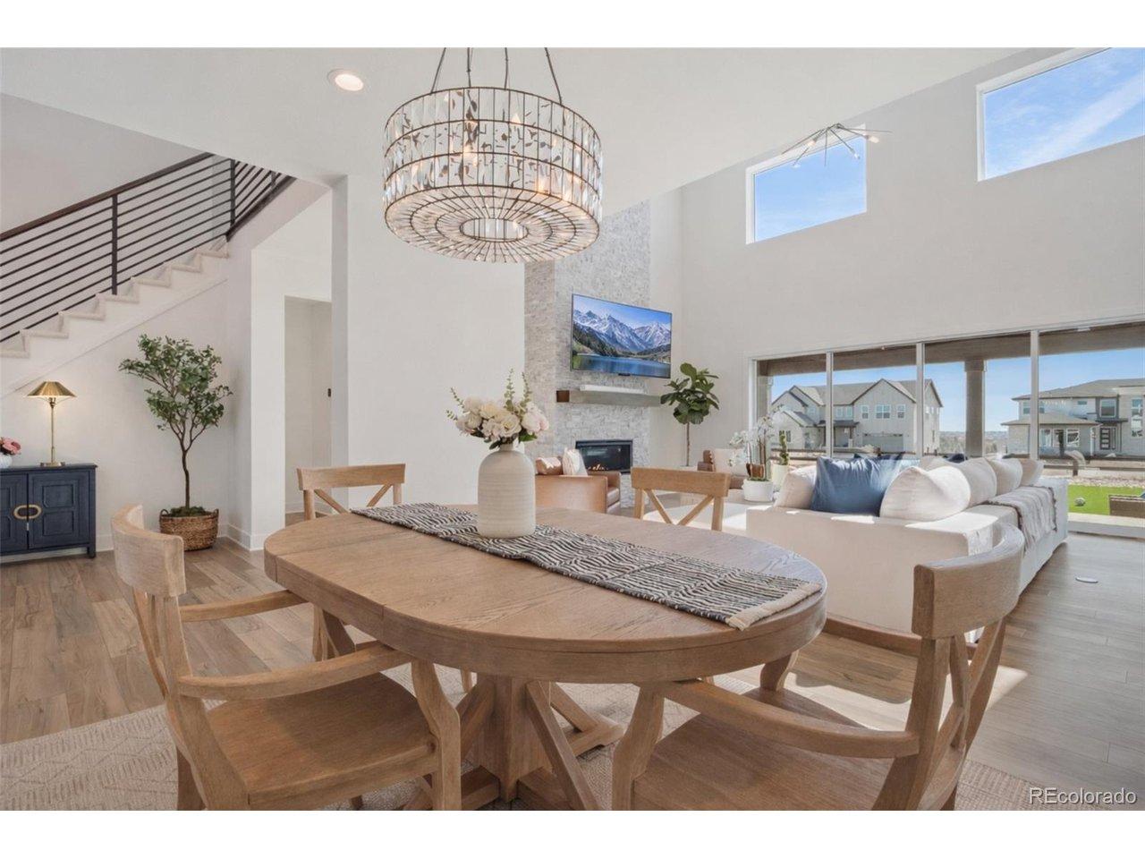 Image 3: Formal Dining area that overlooks the open layout to living and kitchen areas. Image 3: Formal Dining area that overlooks the open layout to living and kitchen areas.