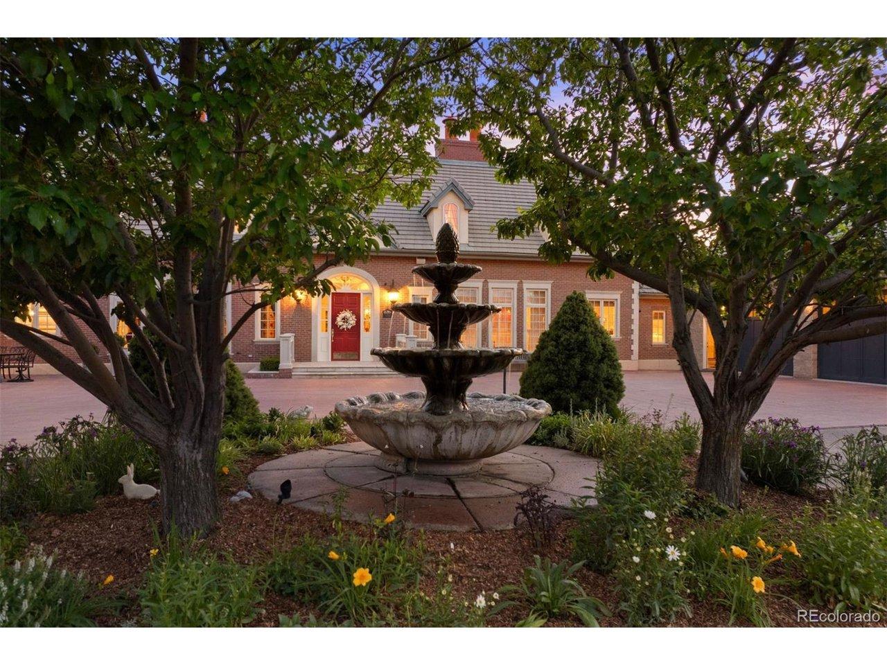 Image 3: Timeless brick architecture and classic dormer rooflines emerge from the landscape.