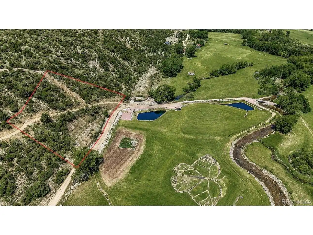 Image 1: LOT 1A- your future home site . Red outline is approximate for boundary line on Lot 1 A