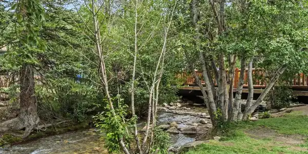 Image 2: The Snake River winds right past your door, framed by a grove of Aspens . Image 2: The Snake River winds right past your door, framed by a grove of Aspens .