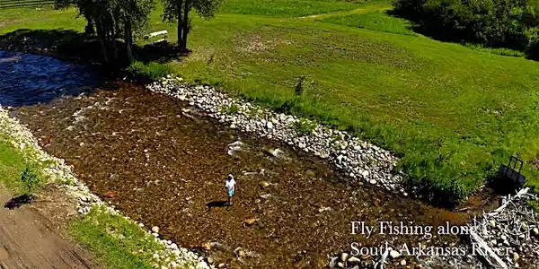 Image 4: Fly fish along the South Arkansas River footsteps from your home.