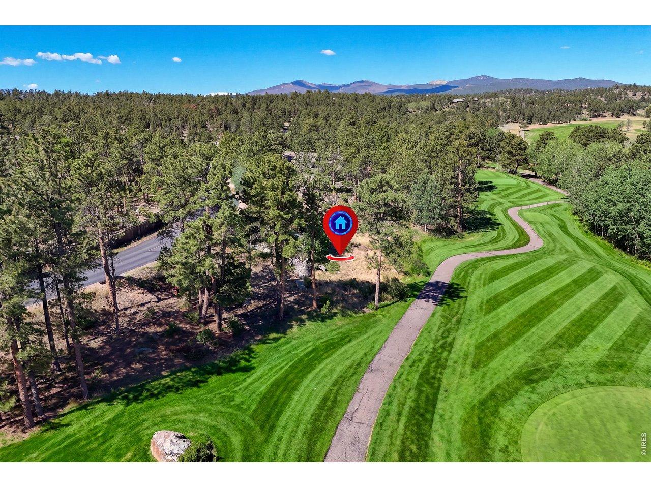 Image 3: Aerial view looking down the 10th fairway west toward the 10th green with Bald Mountain in the distance. Image 3: Aerial view looking down the 10th fairway west toward the 10th green with Bald Mountain in the distance.