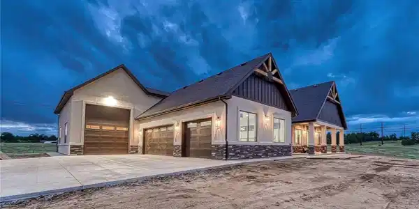 Image 2: Two distinct living spaces and 4-car with dedicated RV garage. Image 2: Two distinct living spaces and 4-car with dedicated RV garage.