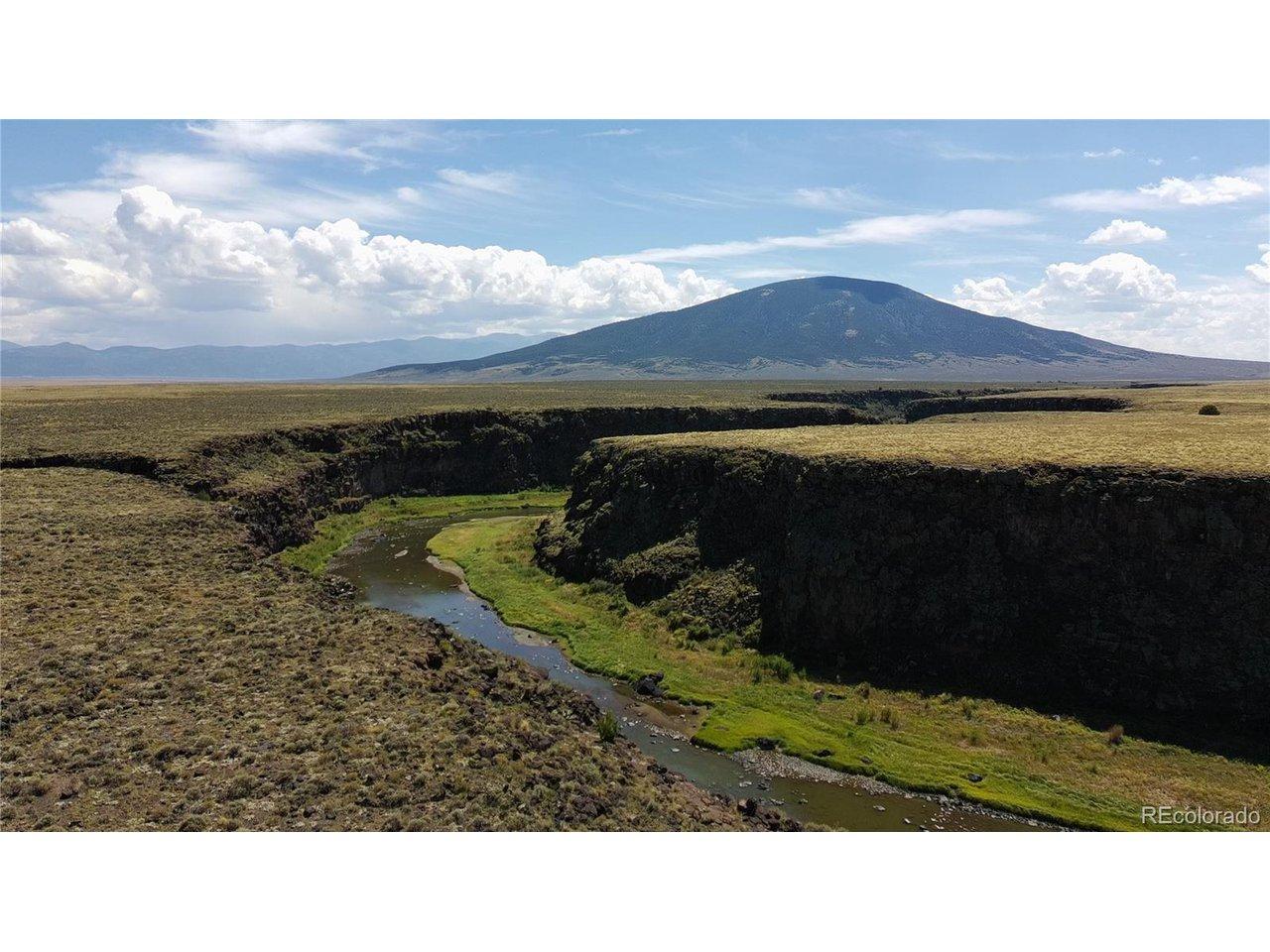 Image 2: Rio Grande Flowing through with Ute Mountain View