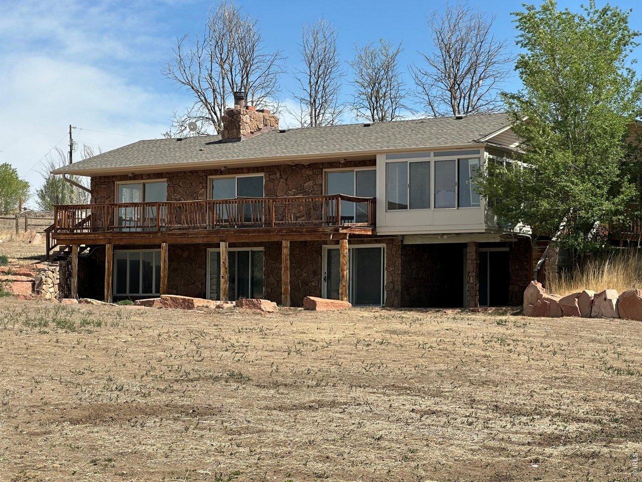 Image 3: Back of house with deck Image 3: Back of house with deck