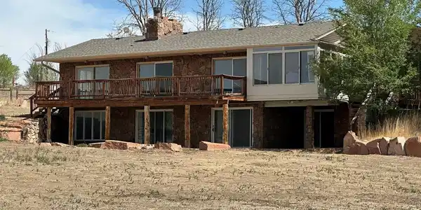 Image 3: Back of house with deck Image 3: Back of house with deck