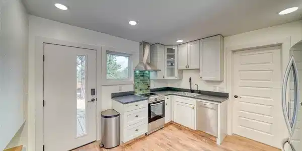 Image 3: Apartment kitchen-stainless steel appliances, LVP flooring, new kitchen cabinets Image 3: Apartment kitchen-stainless steel appliances, LVP flooring, new kitchen cabinets