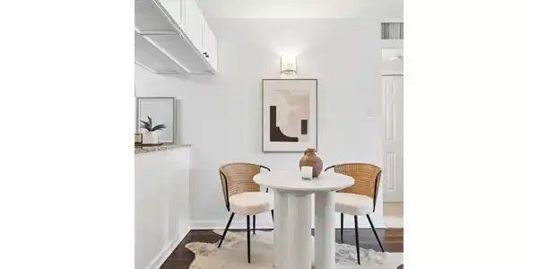 Image 4: Bright dining area connects seamlessly with the living room and kitchen Image 4: Bright dining area connects seamlessly with the living room and kitchen