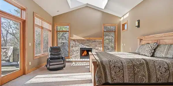 Image 4: Spacious primary offers West facing Deck Access, Gorgeous En Suite Bath and Skylights Image 4: Spacious primary offers West facing Deck Access, Gorgeous En Suite Bath and Skylights