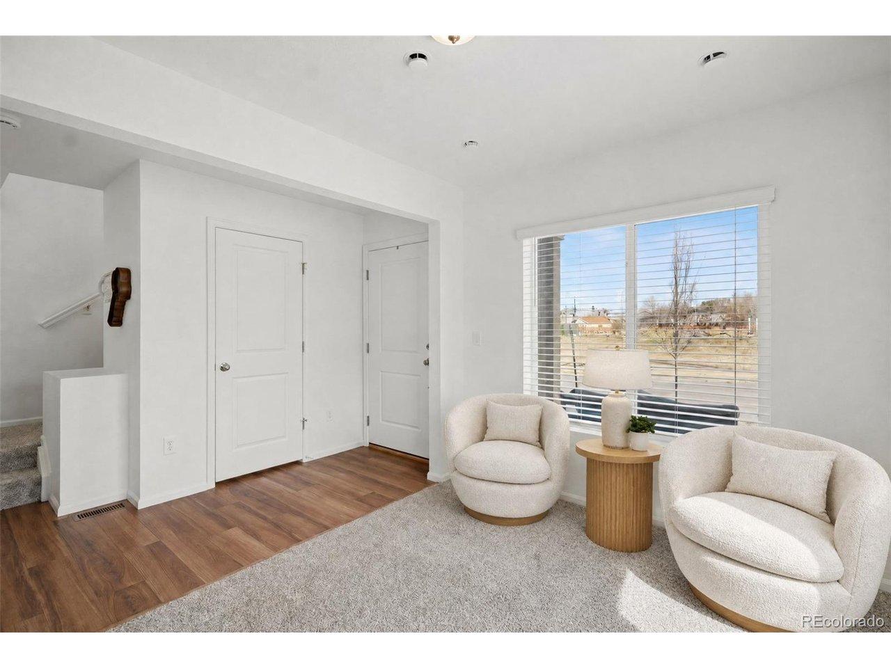 Image 3: First floor den, leading to outdoor space; Virtually Staged Image 3: First floor den, leading to outdoor space; Virtually Staged