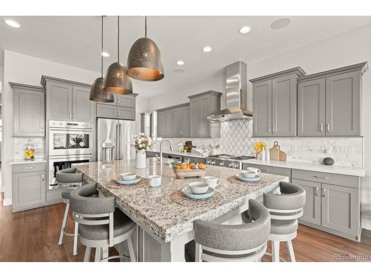Image 3: Massive custom island with 2.5" granite - perfect for casual dining Image 3: Massive custom island with 2.5" granite - perfect for casual dining