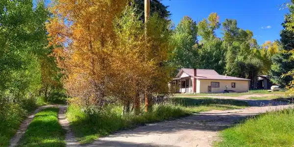 Image 3: First glimpse of Cottage off of the circular drive entrance. Image 3: First glimpse of Cottage off of the circular drive entrance.