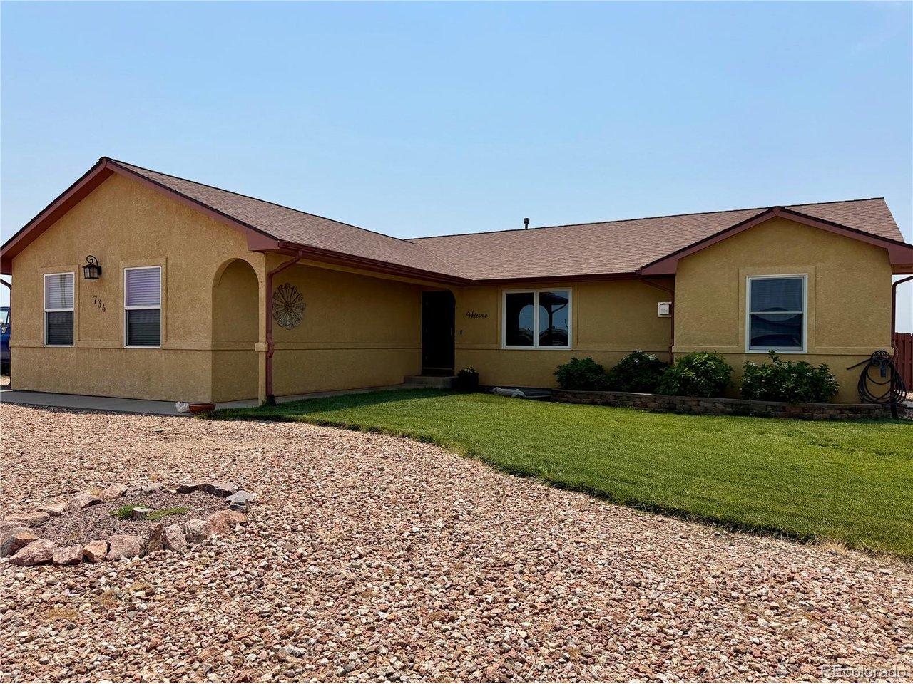 Image 2: This beautiful rancher has RV parking with a side gate, 3 car garage and privacy fence in the back yard