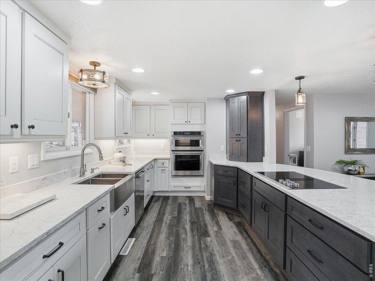 Image 2: Beautiful remodeled kitchen with custom cabinetry
