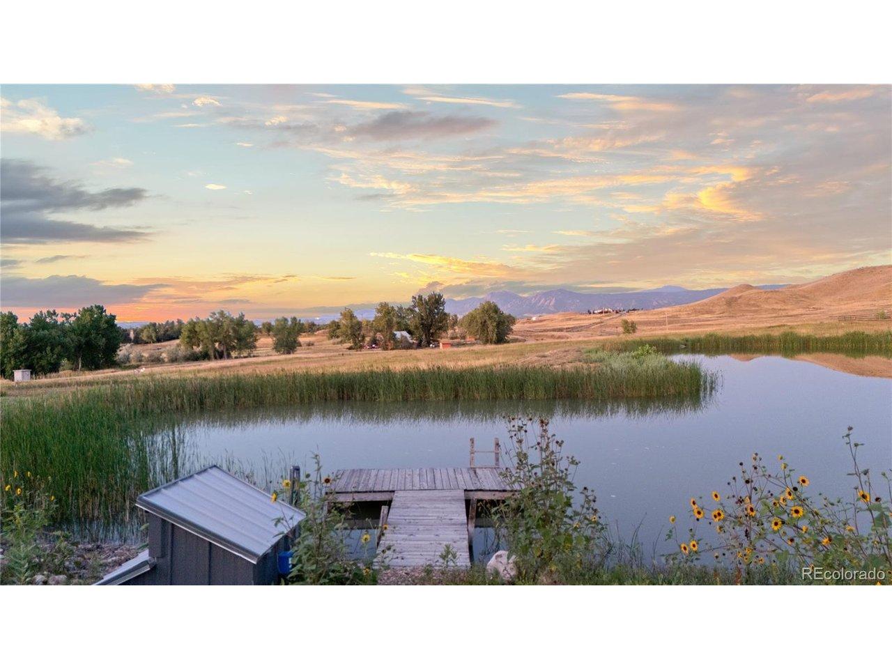 Image 3: One-acre stocked pond with deck and footbridges Image 3: One-acre stocked pond with deck and footbridges