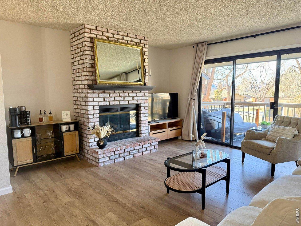 Image 3: Wood burning fireplace adds warmth and charm