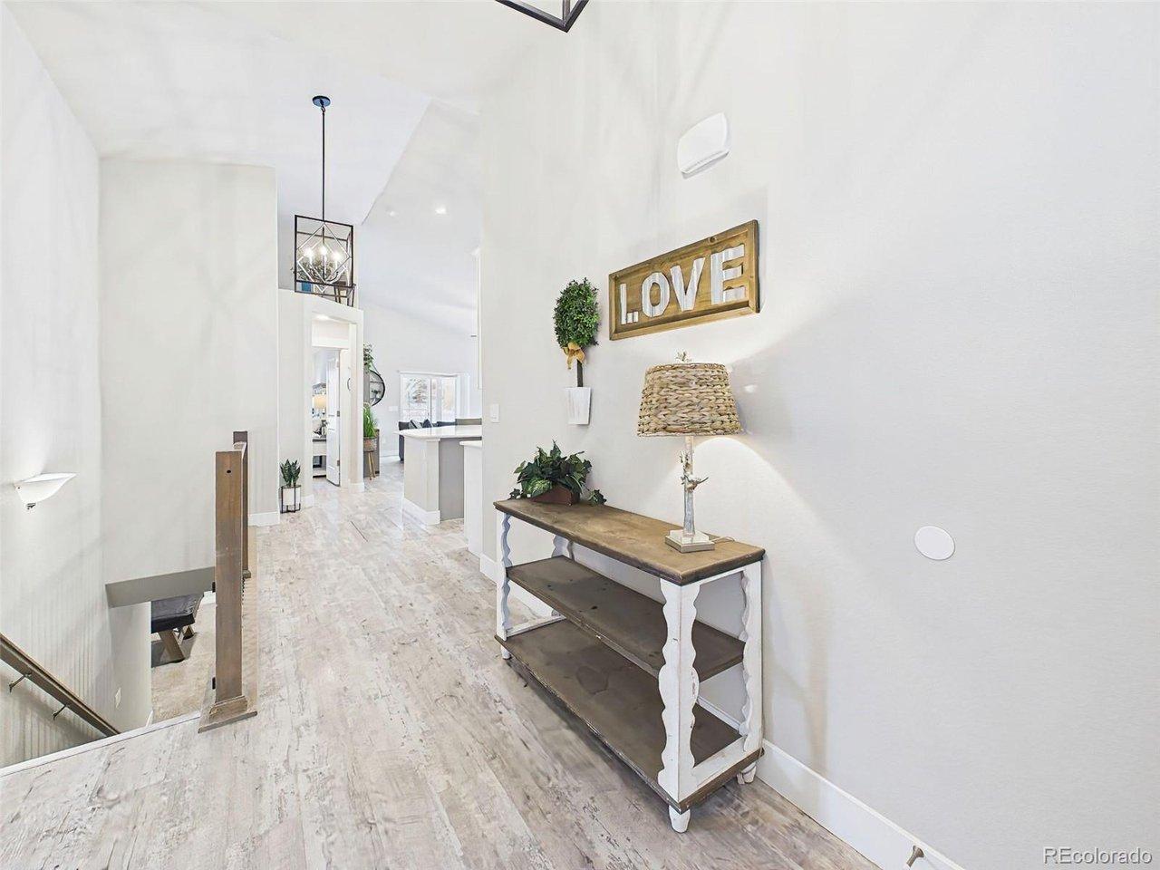 Image 3: Wide hallway with clean finishes, natural light, and open sightlines into main living area. Image 3: Wide hallway with clean finishes, natural light, and open sightlines into main living area.