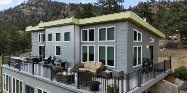 Image 3: Large entertaining deck for morning coffee or evening sunsets.