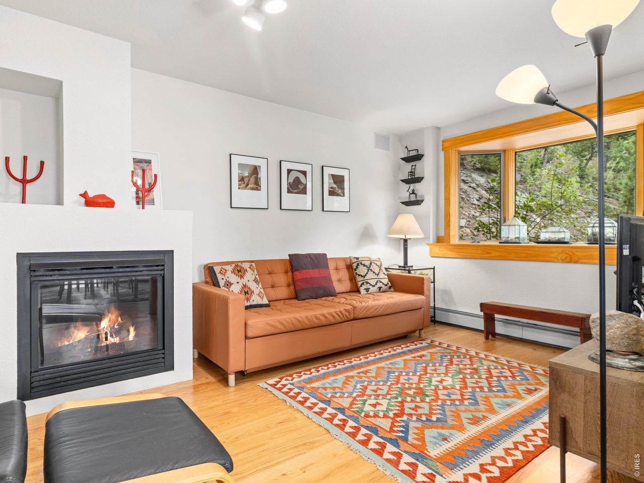 Image 4: Living Room with Hardwood Floors and Gas Fireplace Image 4: Living Room with Hardwood Floors and Gas Fireplace
