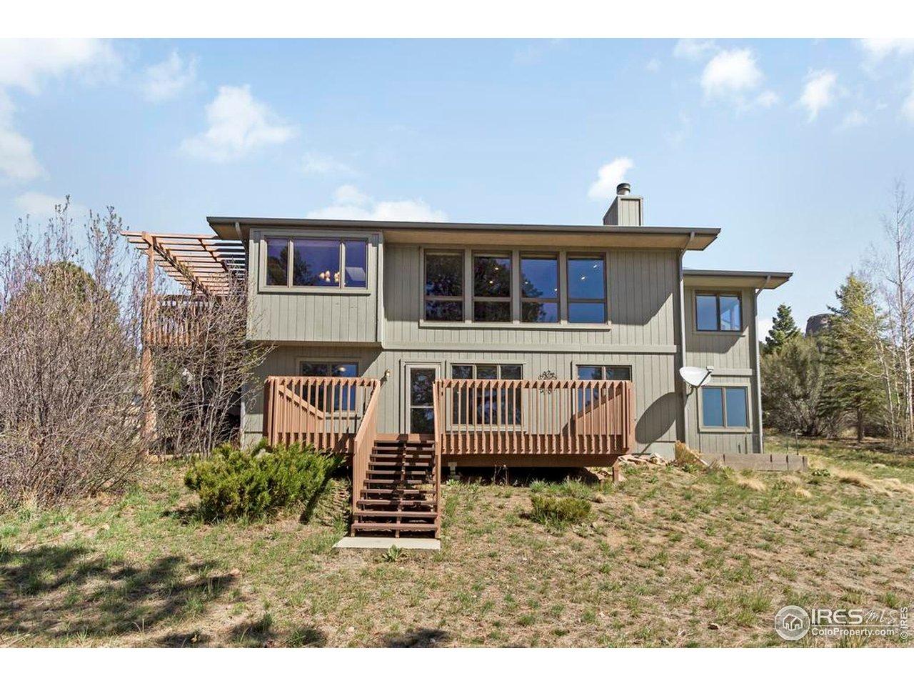 Image 2: View from the back yard. Room for the kids to play. Enjoy mountain living at its best! Image 2: View from the back yard. Room for the kids to play. Enjoy mountain living at its best!