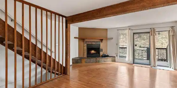 Image 3: Living Room with fireplace and back porch. Image 3: Living Room with fireplace and back porch.