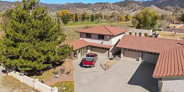 Image 4: Aerial view of detached garage