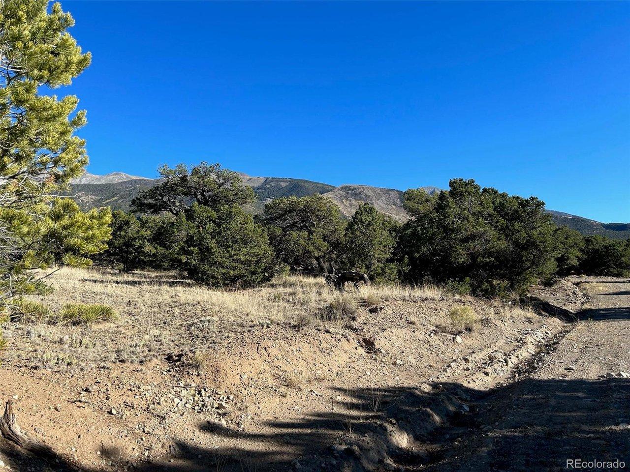 Image 1: SE boundary line area. This property has two frontage roads beside it, this view is Eagle Nest Road. Image 1: SE boundary line area. This property has two frontage roads beside it, this view is Eagle Nest Road.