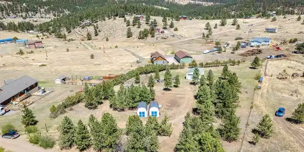 Image 2: Private lot surrounded by beautiful junipers. Image 2: Private lot surrounded by beautiful junipers.