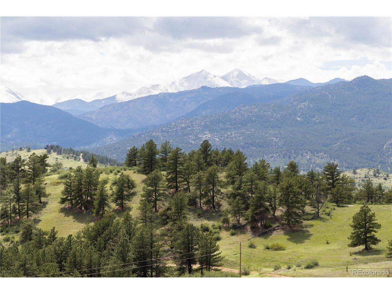 Image 2: Ponderosa pine forested mountain land with multiple build sites - private 84-acre parcel Lyons Colorado - improved land investment opportunity Front Range Image 2: Ponderosa pine forested mountain land with multiple build sites - private 84-acre parcel Lyons Colorado - improved land investment opportunity Front Range