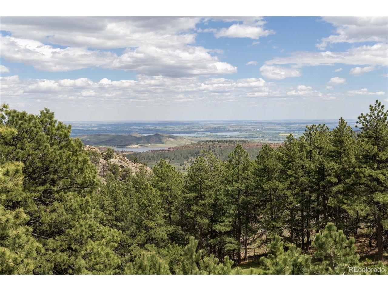 Image 3: 360-degree views from elevated Colorado mountain land - red rock canyon and eastern plains vista - 84 acres Larimer County improved land near Carter Lake Image 3: 360-degree views from elevated Colorado mountain land - red rock canyon and eastern plains vista - 84 acres Larimer County improved land near Carter Lake