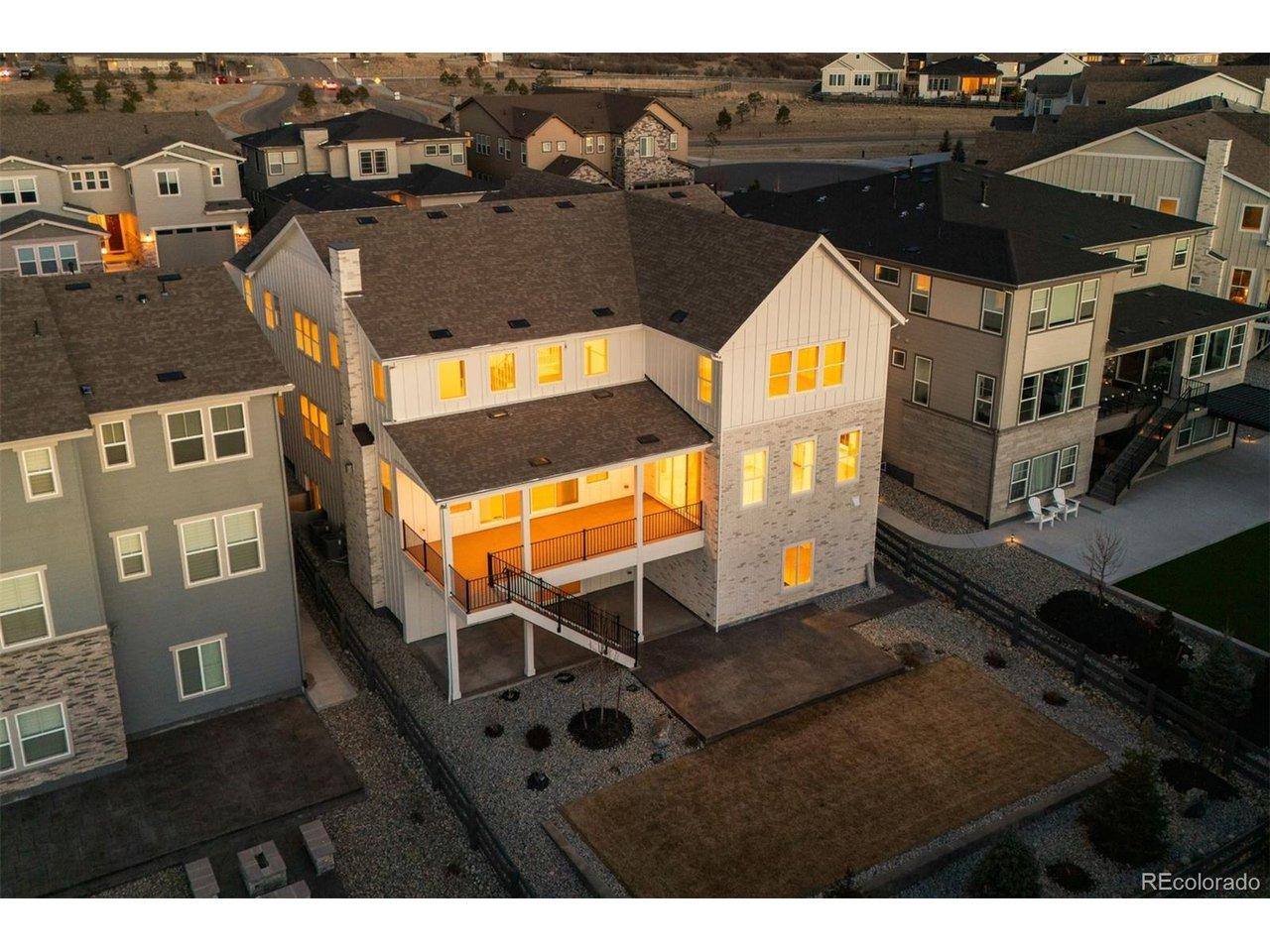 Image 2: A flat, fenced back yard with stamped concrete patio and additional upper covered deck creates an ideal setting for relaxation or gatherings. Image 2: A flat, fenced back yard with stamped concrete patio and additional upper covered deck creates an ideal setting for relaxation or gatherings.