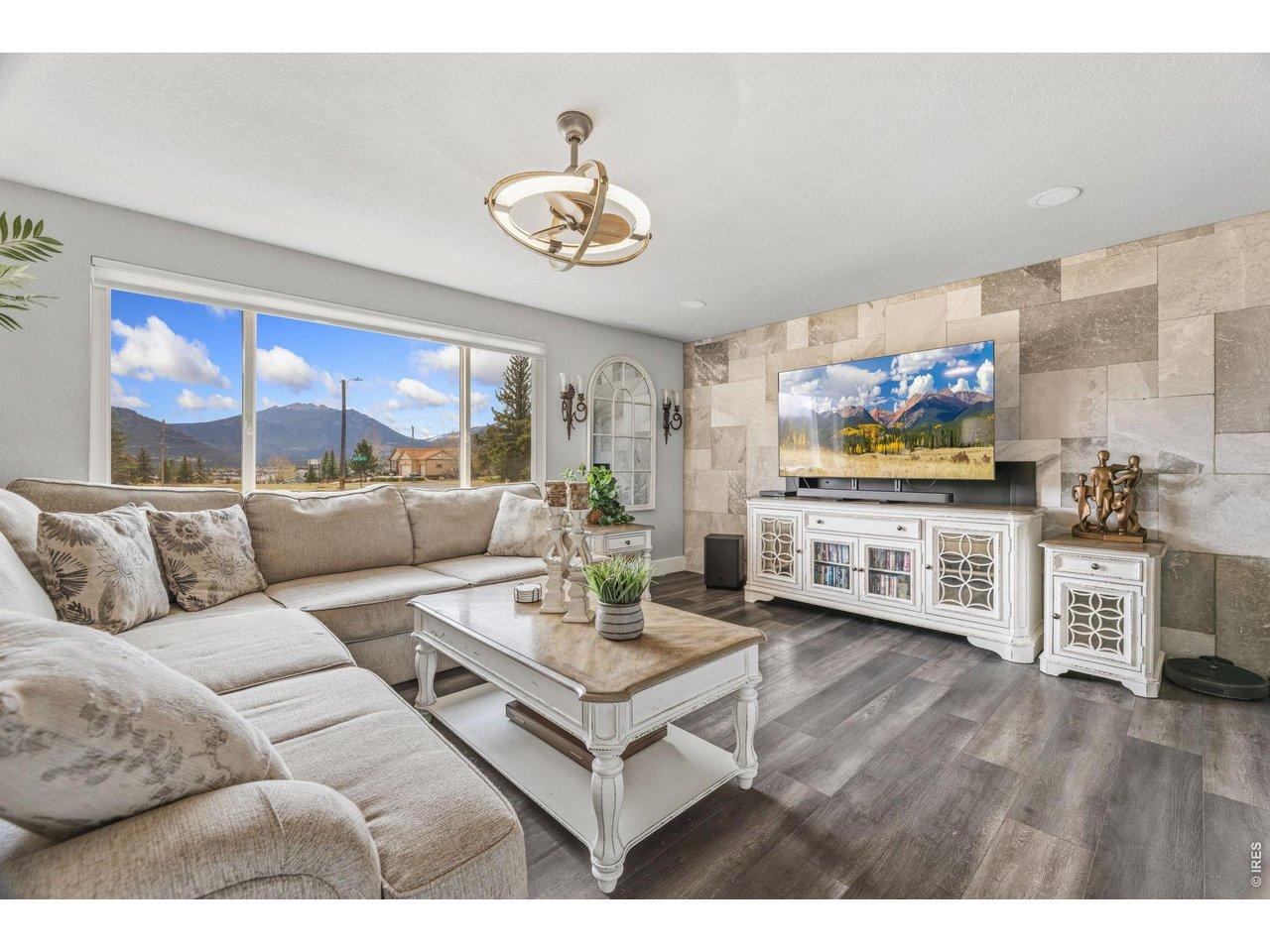 Image 2: Living room with Twin Sister's views Image 2: Living room with Twin Sister's views