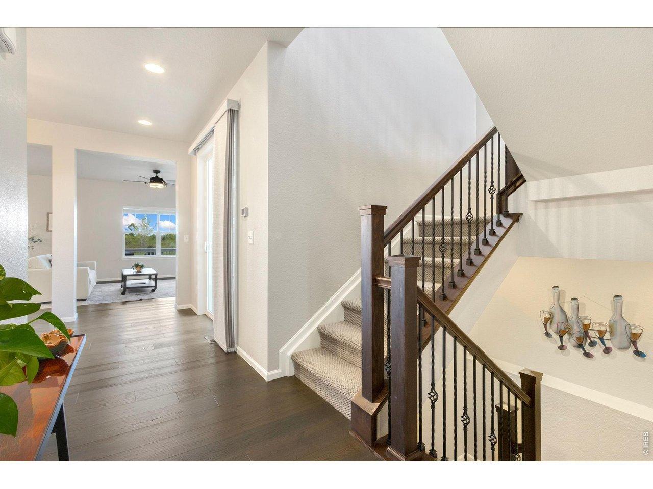 Image 3: Entry Looking Out to Course/ Beautiful Railings on Stairs Image 3: Entry Looking Out to Course/ Beautiful Railings on Stairs