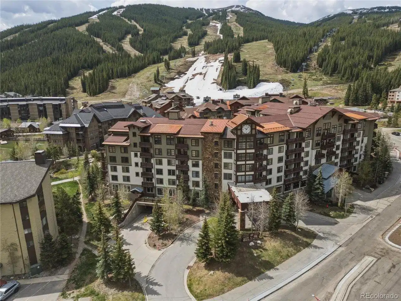Image 1: Welcome to Passage Point in Copper Mountain's Center Village with its grand presence and cute clock tower Image 1: Welcome to Passage Point in Copper Mountain's Center Village with its grand presence and cute clock tower