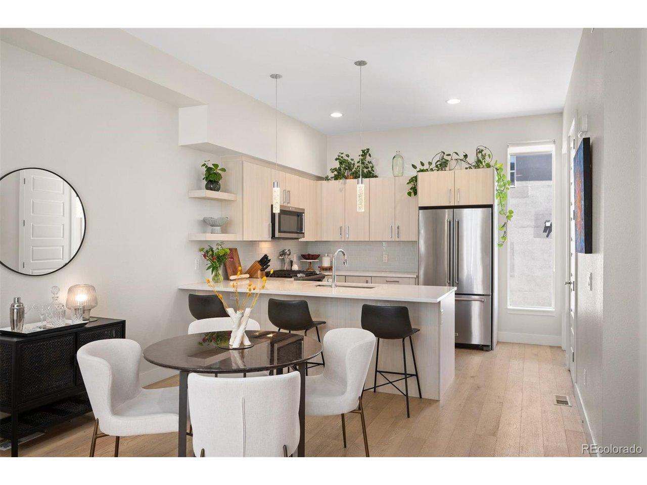 Image 4: A tall window in the kitchen fills the space with beautiful natural light. Image 4: A tall window in the kitchen fills the space with beautiful natural light.