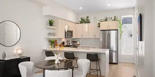 Image 4: A tall window in the kitchen fills the space with beautiful natural light. Image 4: A tall window in the kitchen fills the space with beautiful natural light.