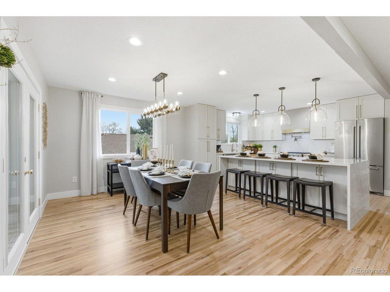 Image 1: Open-concept kitchen and dining designed for everyday living and effortless entertaining. Image 1: Open-concept kitchen and dining designed for everyday living and effortless entertaining.