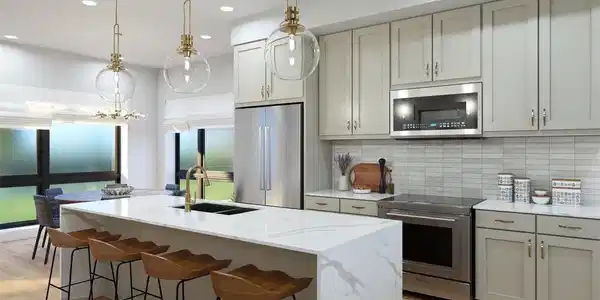 Image 3: Kitchen option featuring waterfall Quartz countertops, Tharp cabinetry and sleek appliances. Disclaimer: Images are representative of available finishes. Finishes in homes under construction may vary.