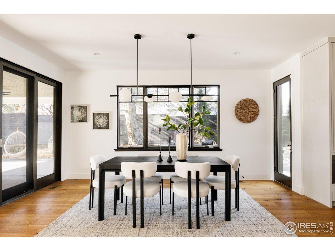Image 4: Doors connect to the outdoor patio and pool space with ease of living in mind. Image 4: Doors connect to the outdoor patio and pool space with ease of living in mind.
