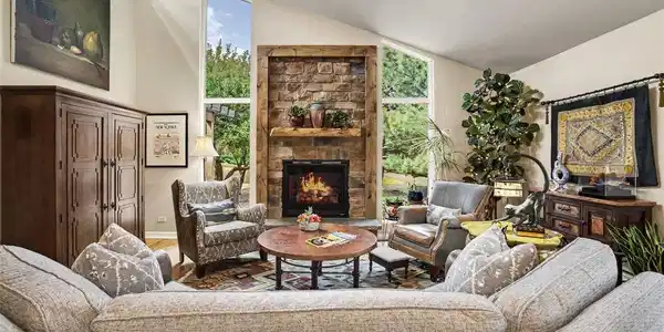 Image 4: The soaring ceiling enhances the sense of openness, while expansive windows frame peaceful views of the surrounding greenery. Image 4: The soaring ceiling enhances the sense of openness, while expansive windows frame peaceful views of the surrounding greenery.