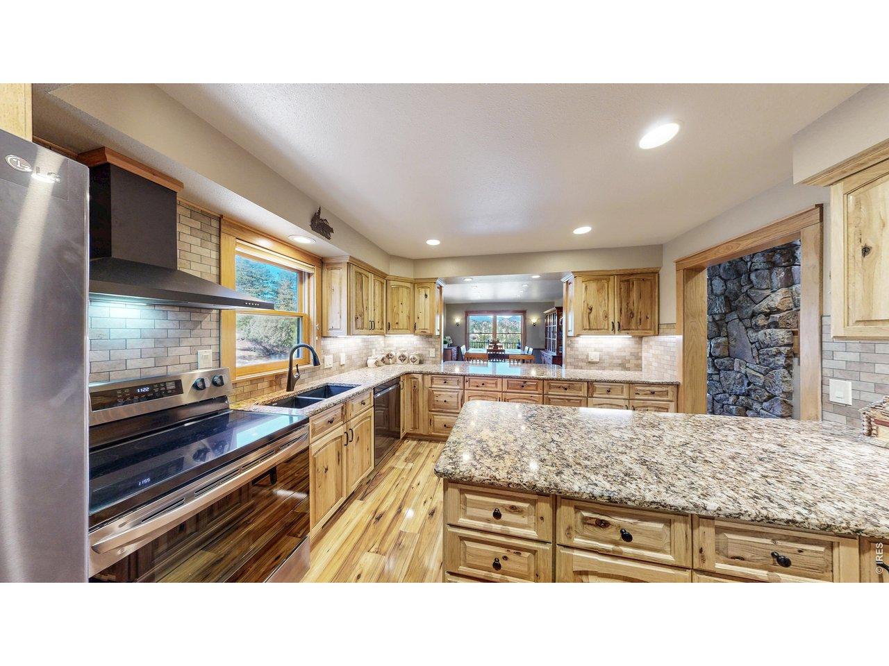 Image 4: New Kitchen Cabinets in Knotty Hickory.