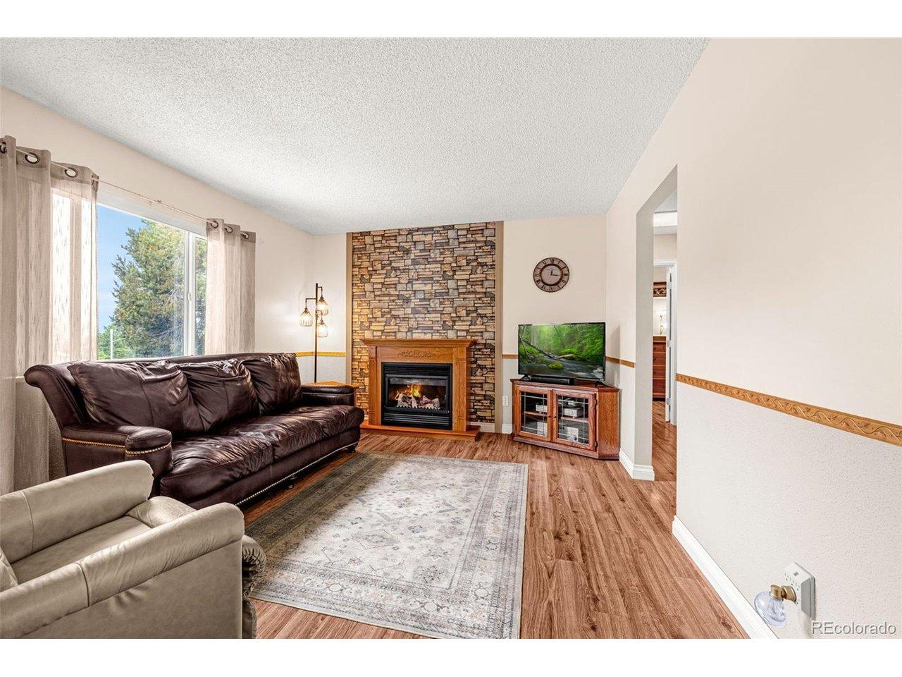 Image 4: Living room offers beautiful Pikes Peak views, abundance of light and shade from the trees. Image 4: Living room offers beautiful Pikes Peak views, abundance of light and shade from the trees.
