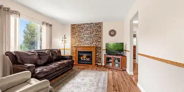 Image 4: Living room offers beautiful Pikes Peak views, abundance of light and shade from the trees. Image 4: Living room offers beautiful Pikes Peak views, abundance of light and shade from the trees.