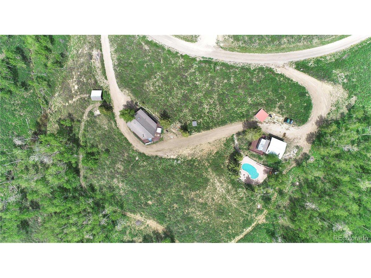 Image 2: Aerial - In-ground pool - virtually staged with water