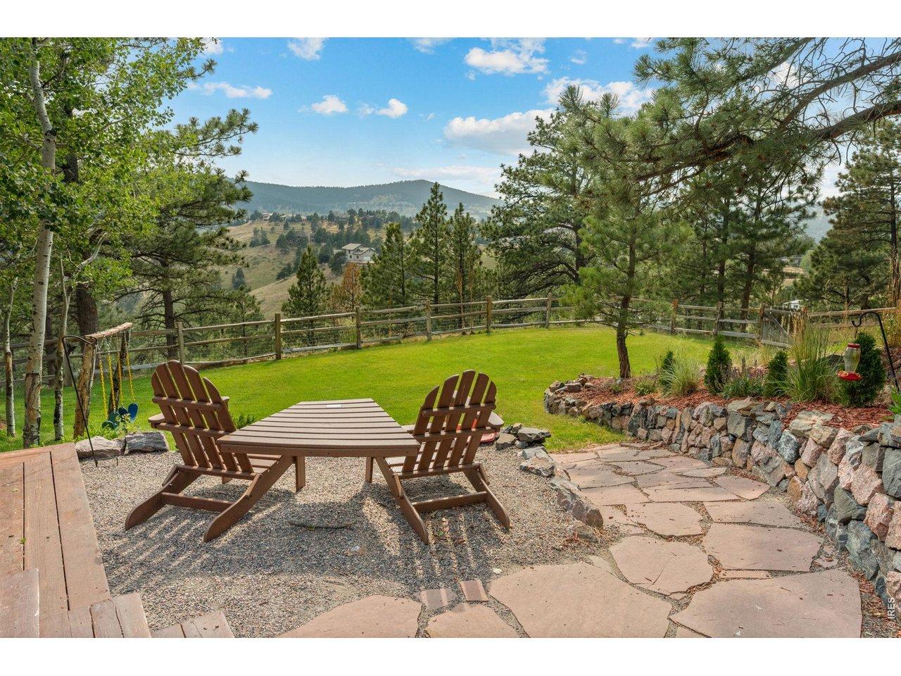 Image 4: Expansive backyard views Image 4: Expansive backyard views