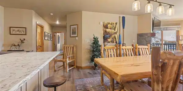 Image 3: Open concept kitchen and living area featuring a spacious, modern design perfect for entertaining. Image 3: Open concept kitchen and living area featuring a spacious, modern design perfect for entertaining.