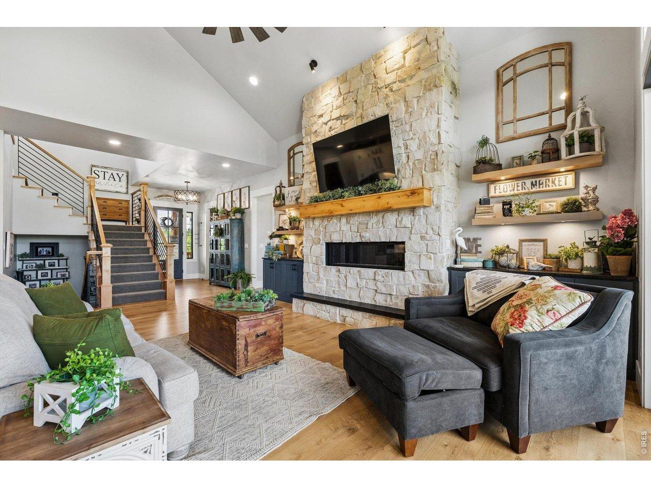 Image 4: Custom stone fireplace with built-in's on each side. Image 4: Custom stone fireplace with built-in's on each side.