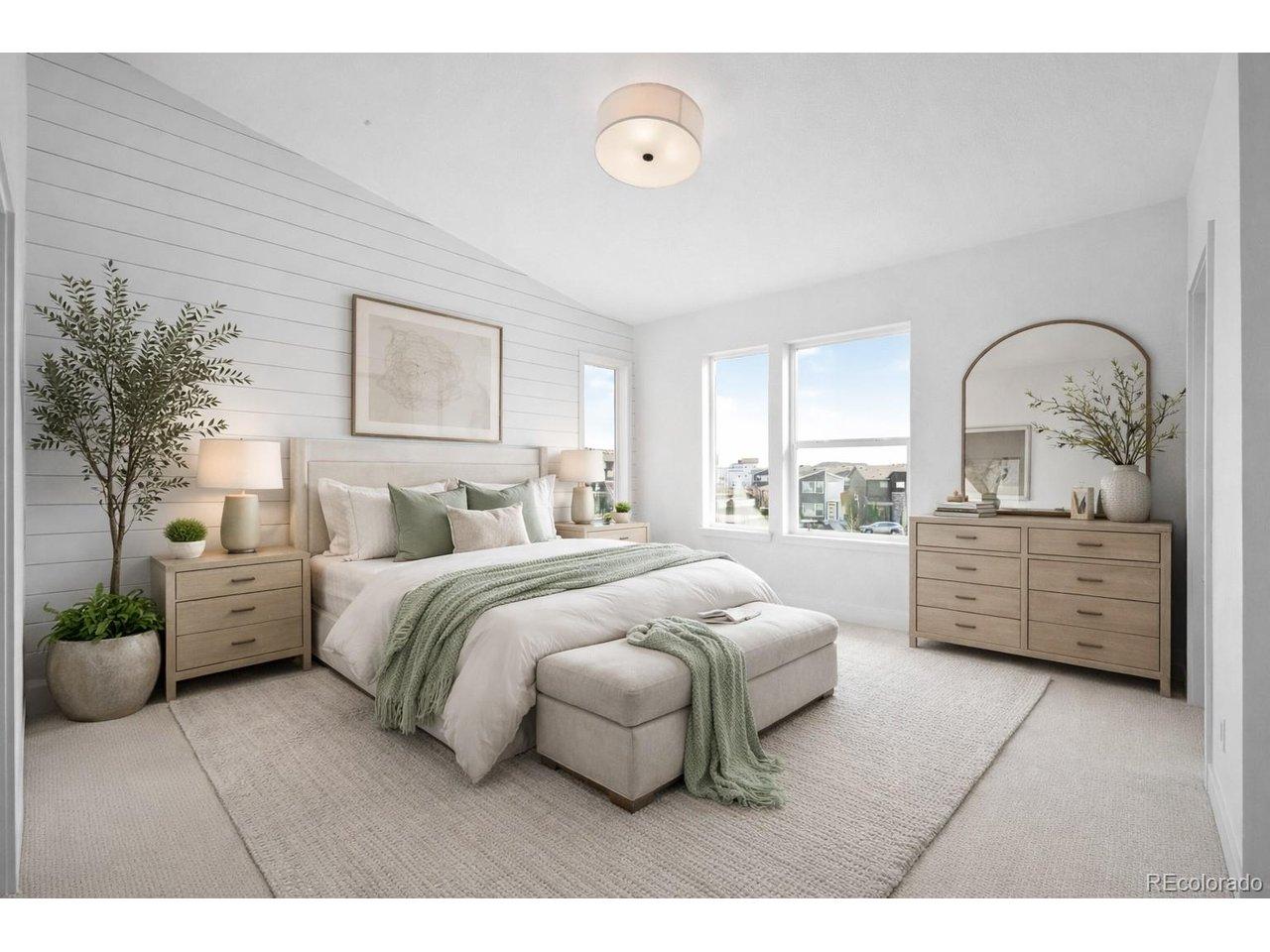 Image 3: Primary suite featuring large walk-in closet and ensuite bathroom. Virtually Staged.