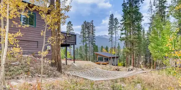 Image 3: Spacious yard with mountain views