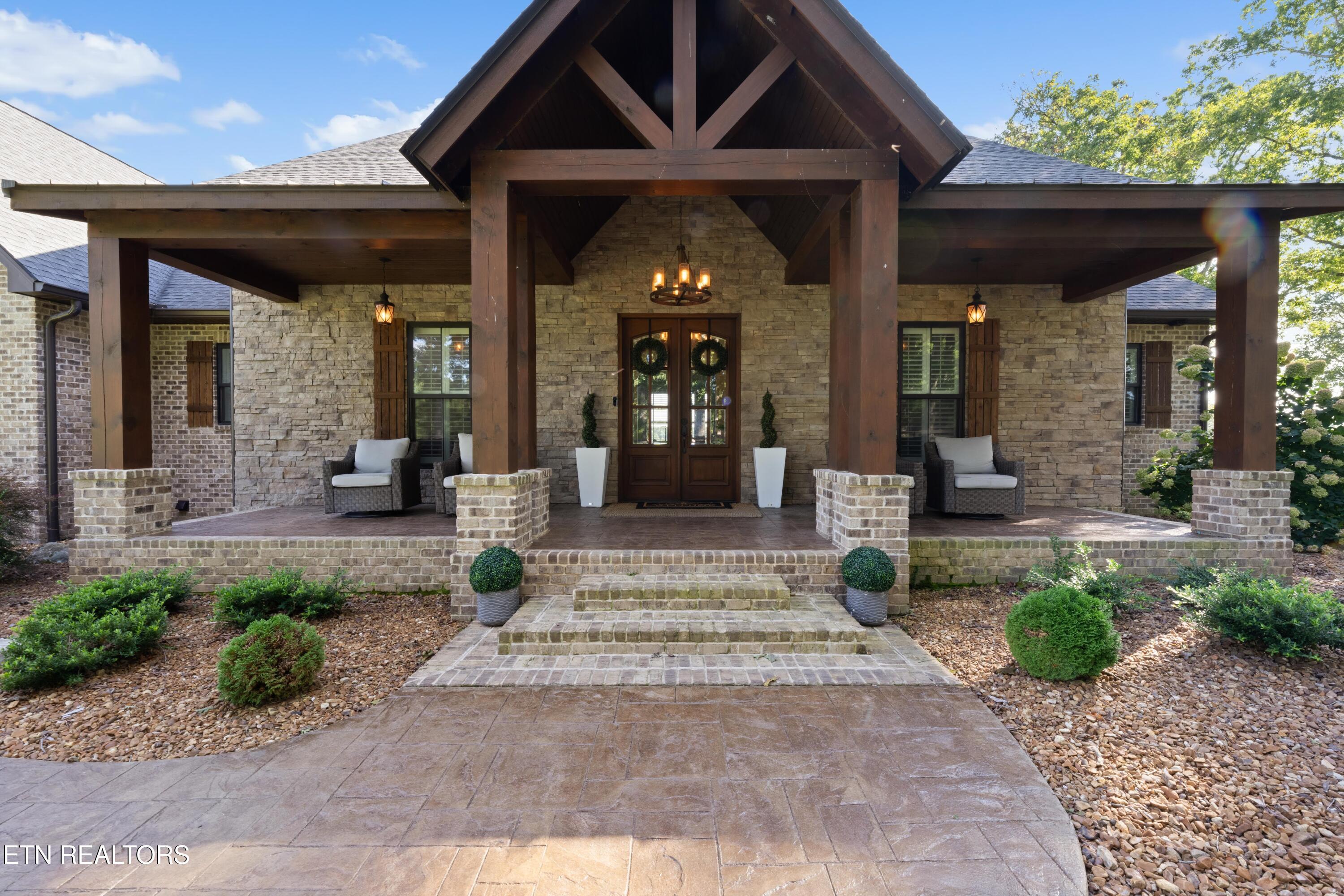 Image 1: house front porch